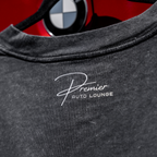 Acid gray t-shirt with 'Premier Auto Lounge' logo and BMW logo in the background.